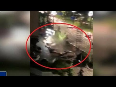 Massive sinkhole swallows 21 cars as road collapses in SW China