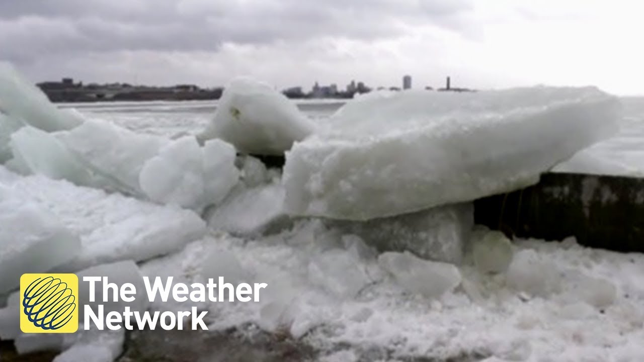 WATCH: Cameraman and reporter react as MASSIVE ice shove surges over wall directly at them