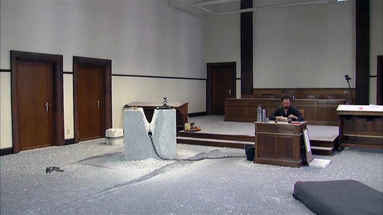 Artist freed after 19 days chained to a marble block