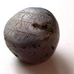 Imagem relacionada a Inscrição de talismã antigo permanece um mistério