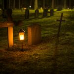 selective focus photo of cemetery lantern
