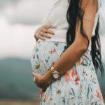 Pregnant lady holding belly