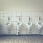 white ceramic sink with faucet