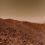 dry rocky land under a gloomy sky