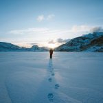 person standing on a snow covered ground