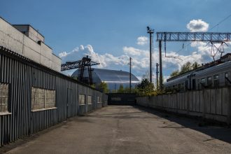 chernobyl new safe confinement by railway tracks